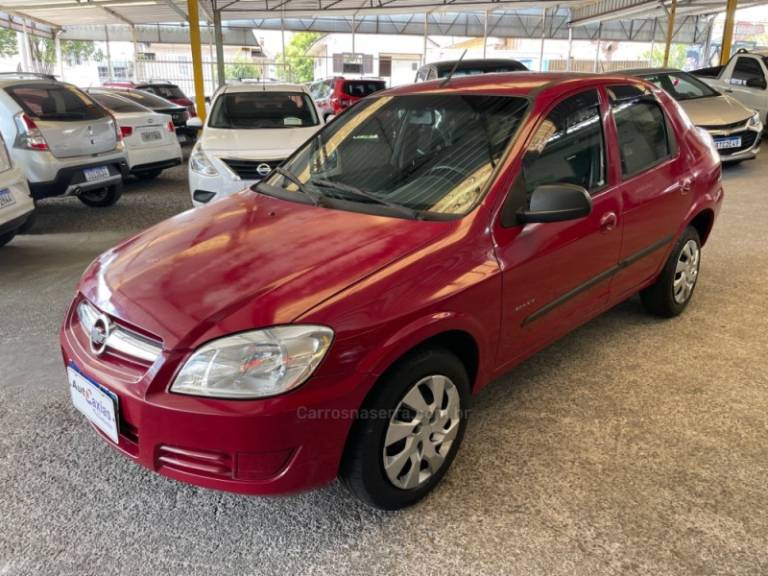 CHEVROLET - PRISMA - 2009/2009 - Vermelha - R$ 20.000,00