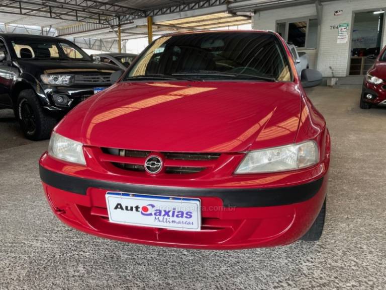 CHEVROLET - CELTA - 2003/2004 - Vermelha - R$ 19.500,00